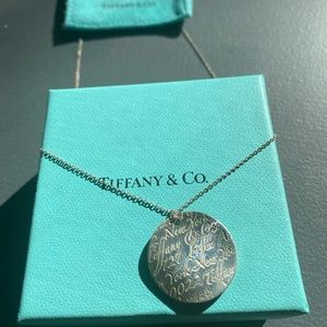 Tiffany & Co. “Love Notes” Necklace 1” silver wavy disk.